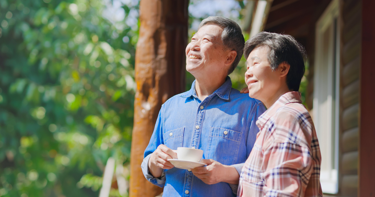 Asian Retired Couple Enjoy Travel