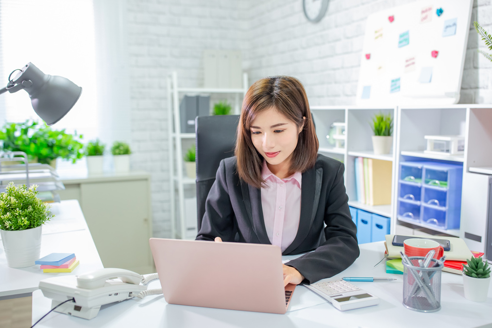 Young Asia Woman Work in Office