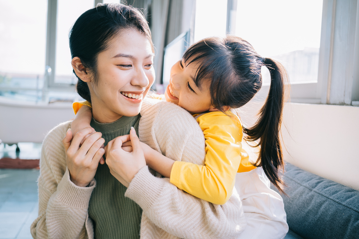 Asian Mother and Daughter at Home Together